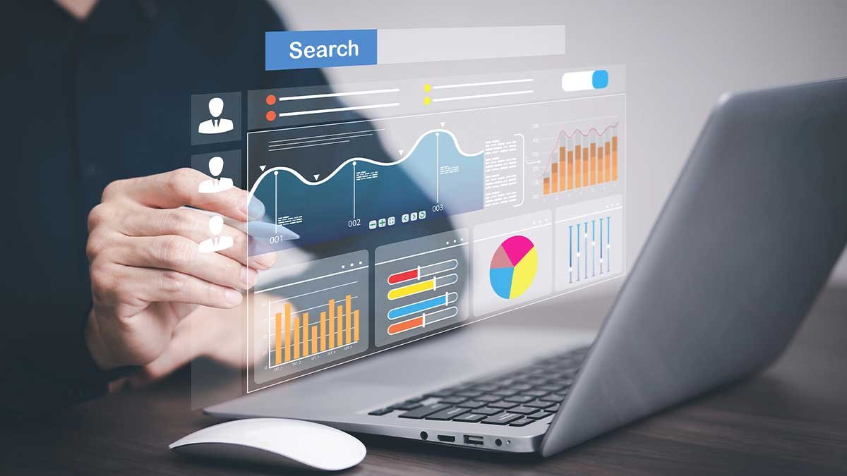 Person analyzing digital marketing data on laptop.