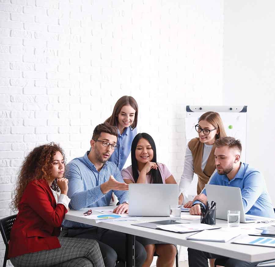 Team collaborating in office meeting